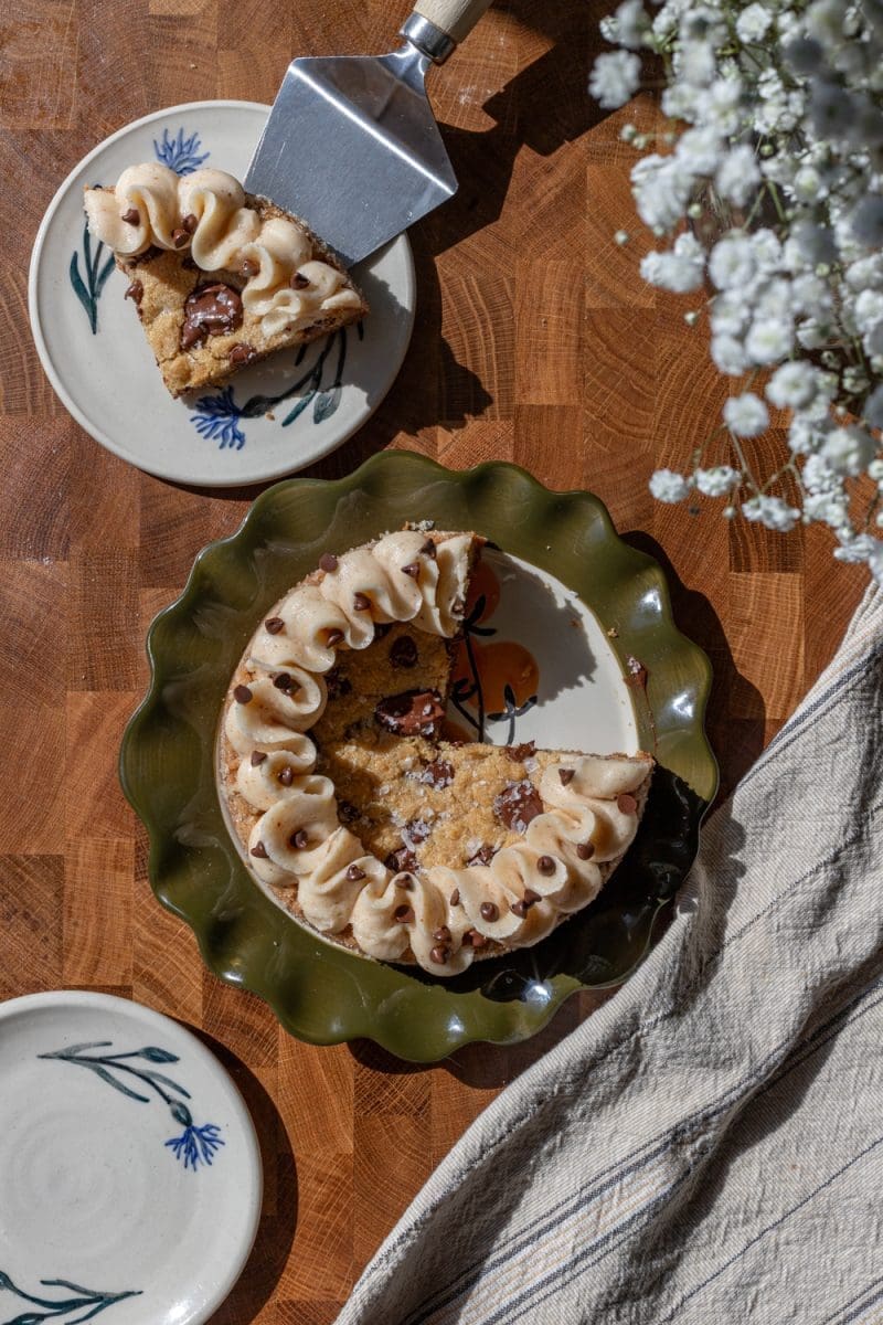 Stylized photo of the cut single serve brown butter cookie cake.