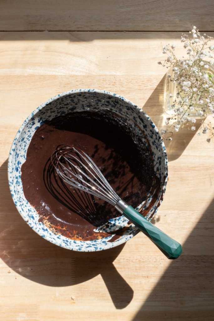 The cocoa powder, espresso, and hot milk whisked together.