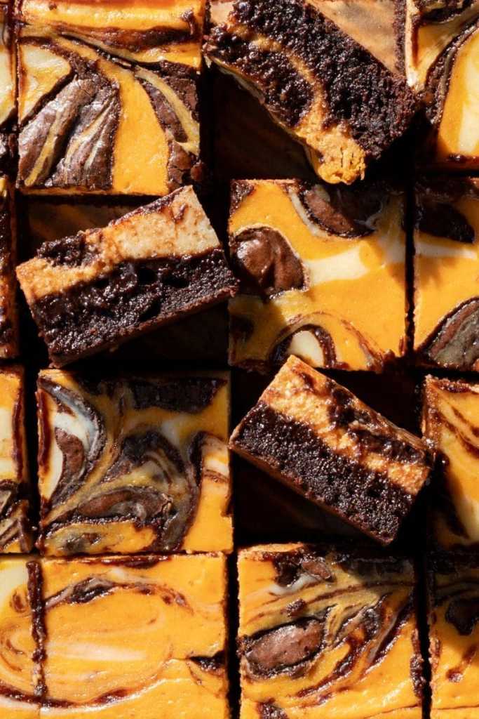 Close up cross-section of the pumpkin cheesecake brownies.