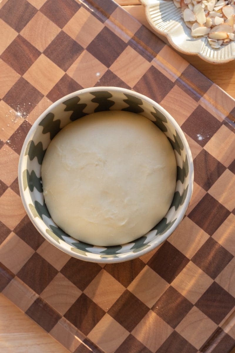 Brioche dough in a bowl.