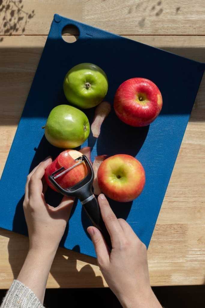 Peeling apples.