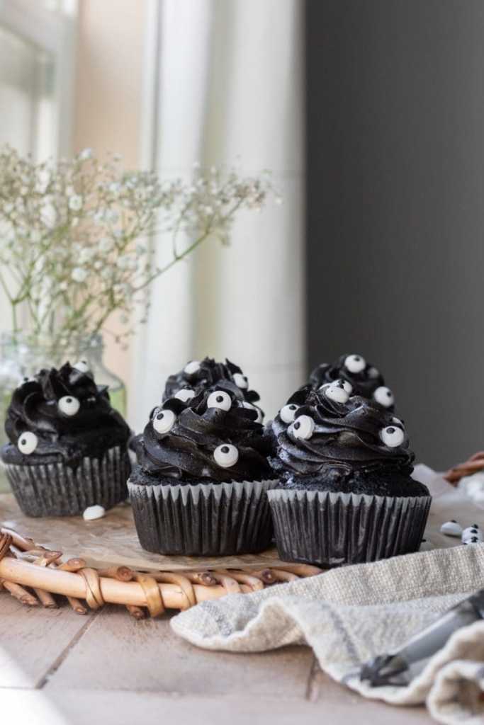 The black cocoa cupcakes on a serving tray.