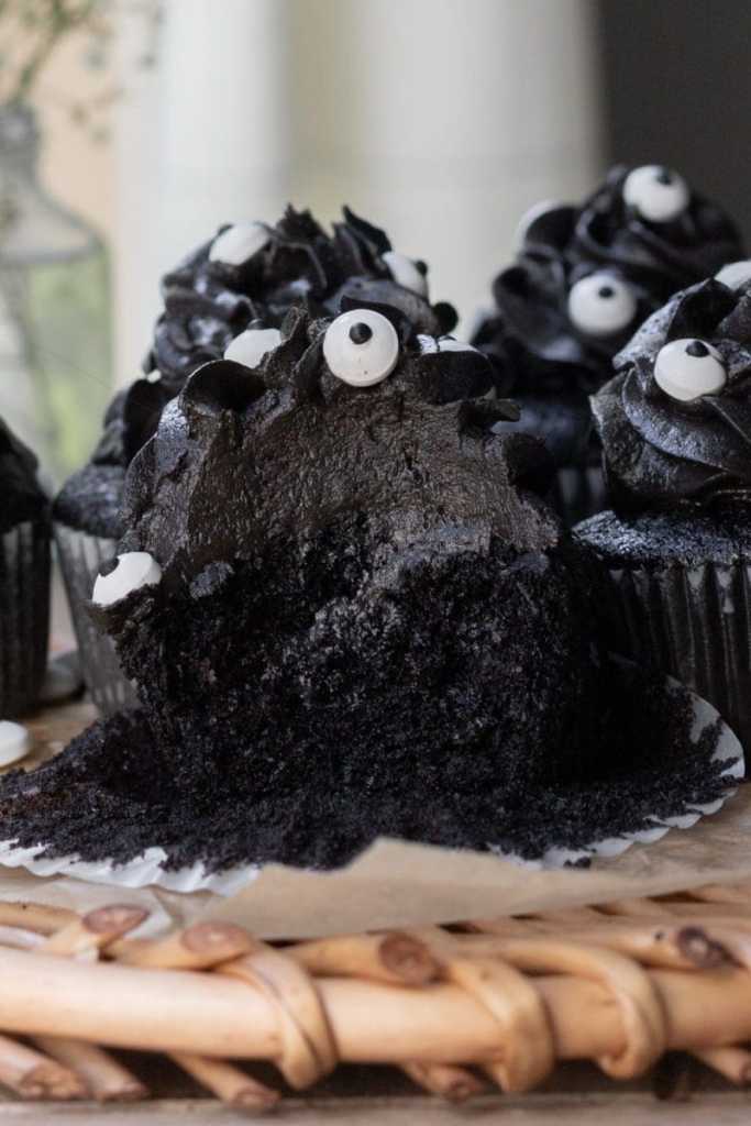 Close up of the cross-section of the black cocoa cupcakes.