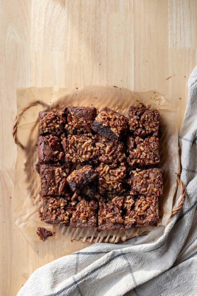Pecan pie brownies on a baking tray.