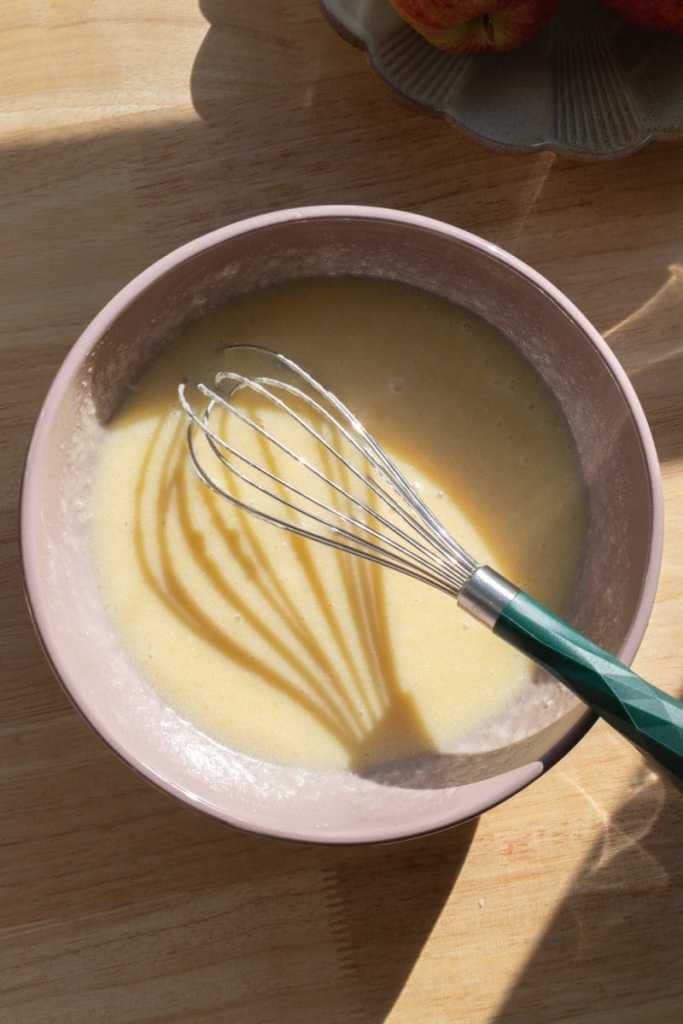 The wet ingredients whisked together in a mixing bowl.