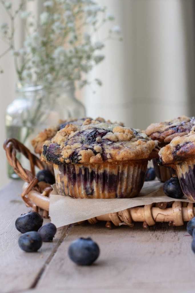 Blueberry coffee cake muffins on a serving tray.