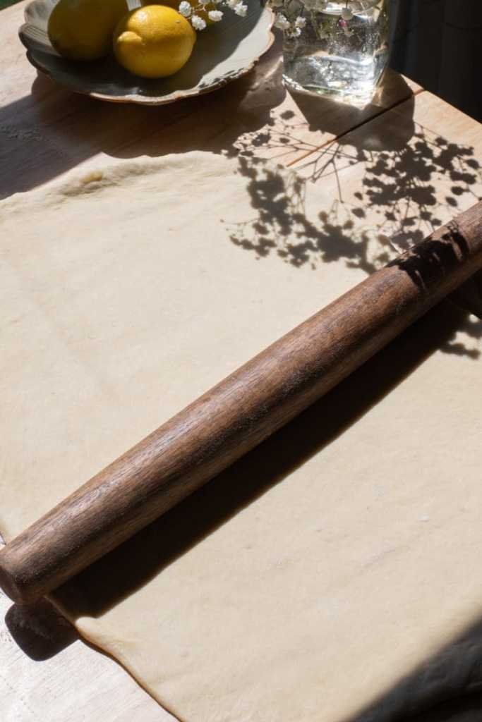 Rolling out the dough.