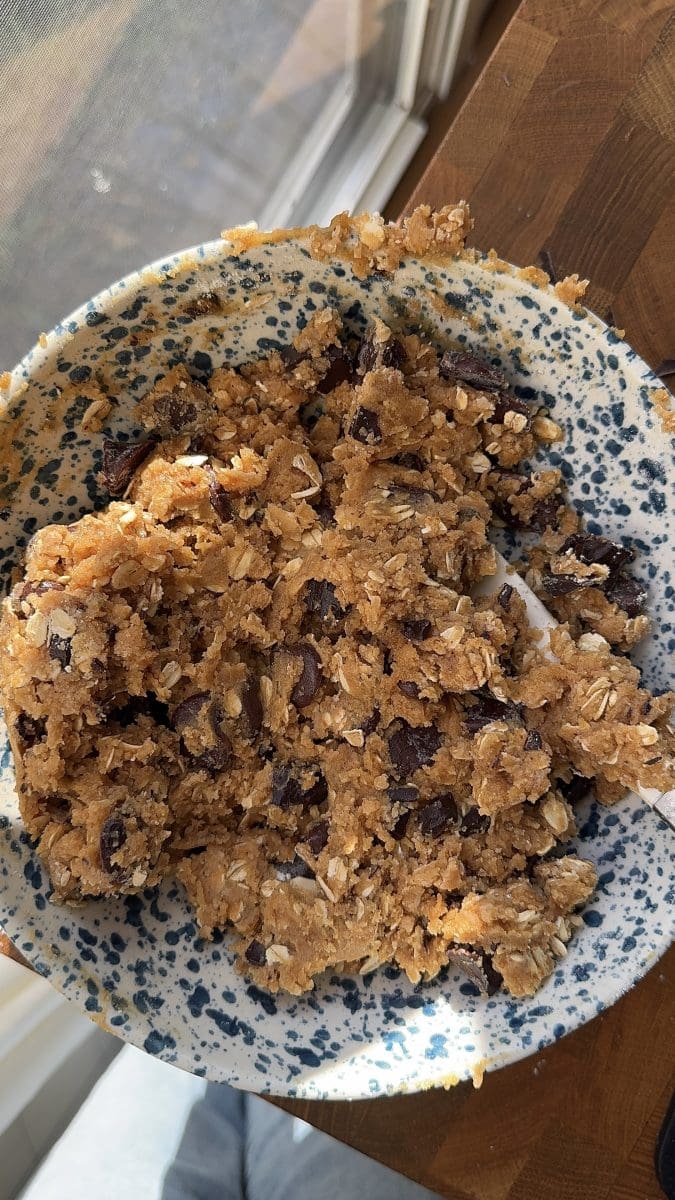 The pumpkin oatmeal chocolate chip cookie dough in a mixing bowl.