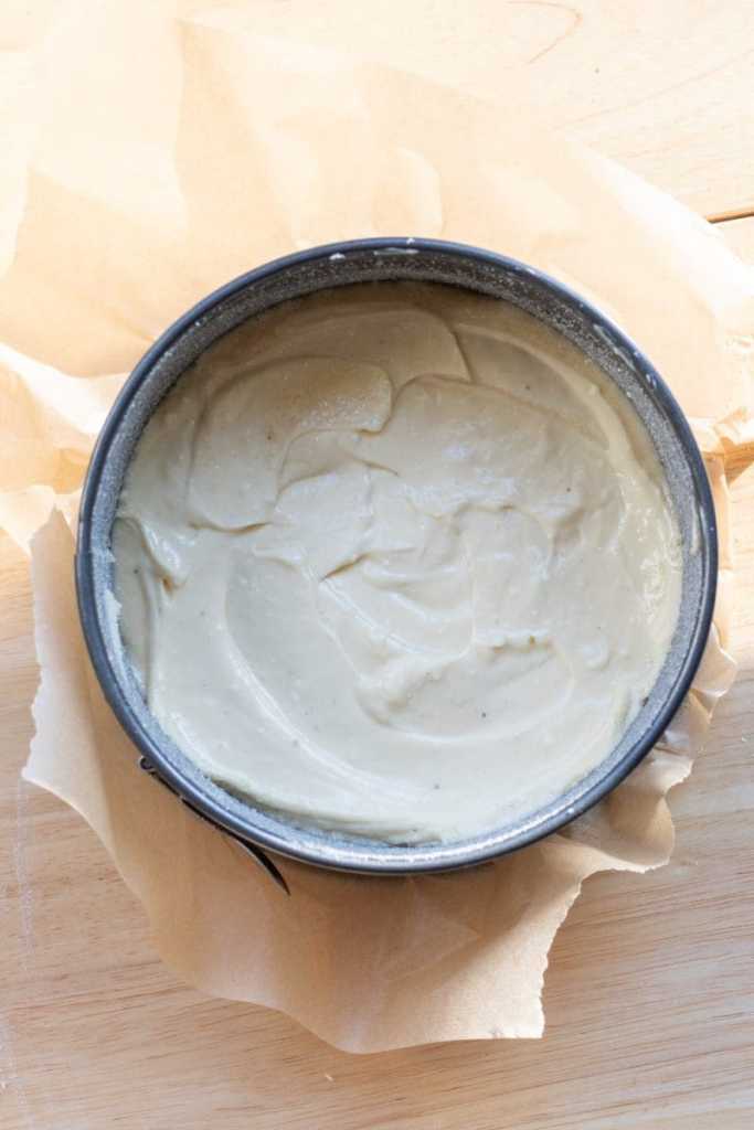 Cream cheese layer in the cake pan.