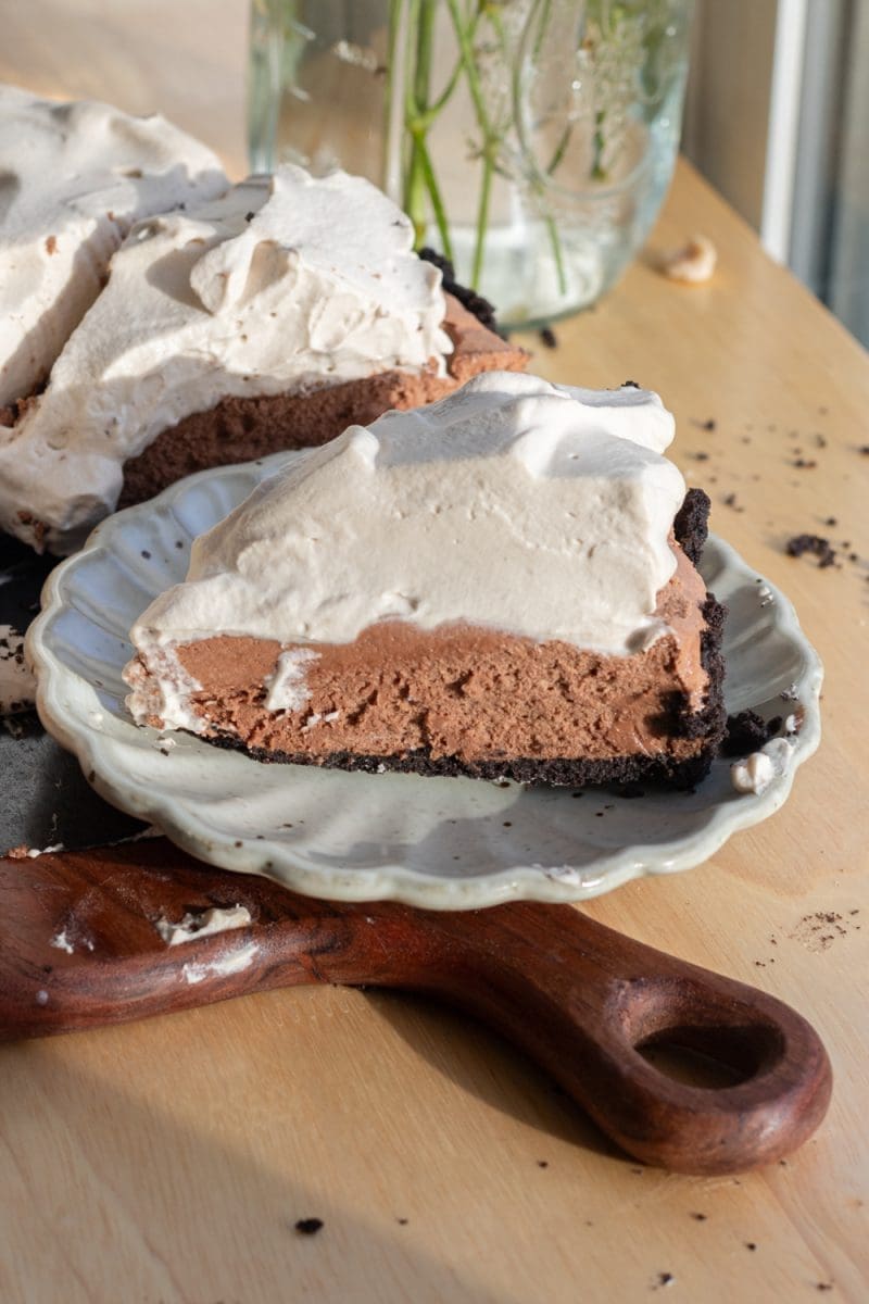 A slice of french silk pie on a plate