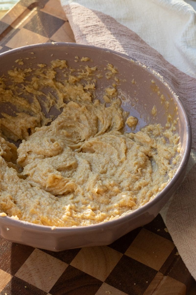 The wet ingredients beaten together in a mixing bowl.