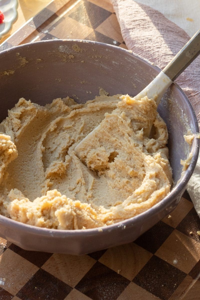 The finished cookie dough in a mixing bowl.