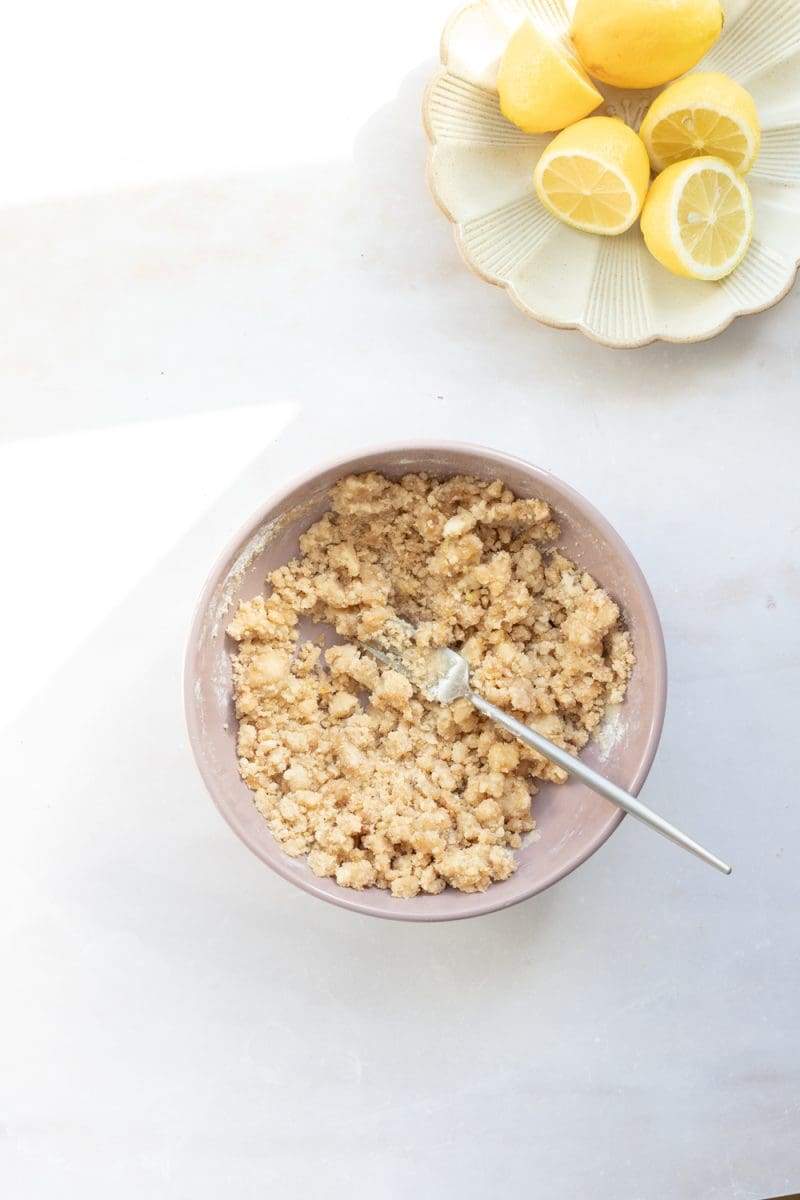 The lemon streusel in a mixing bowl.