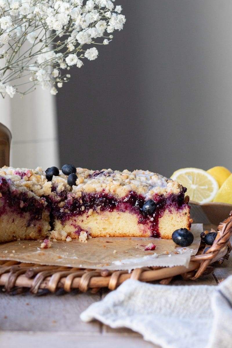 Close up of a cross-section of the lemon blueberry crumb cake