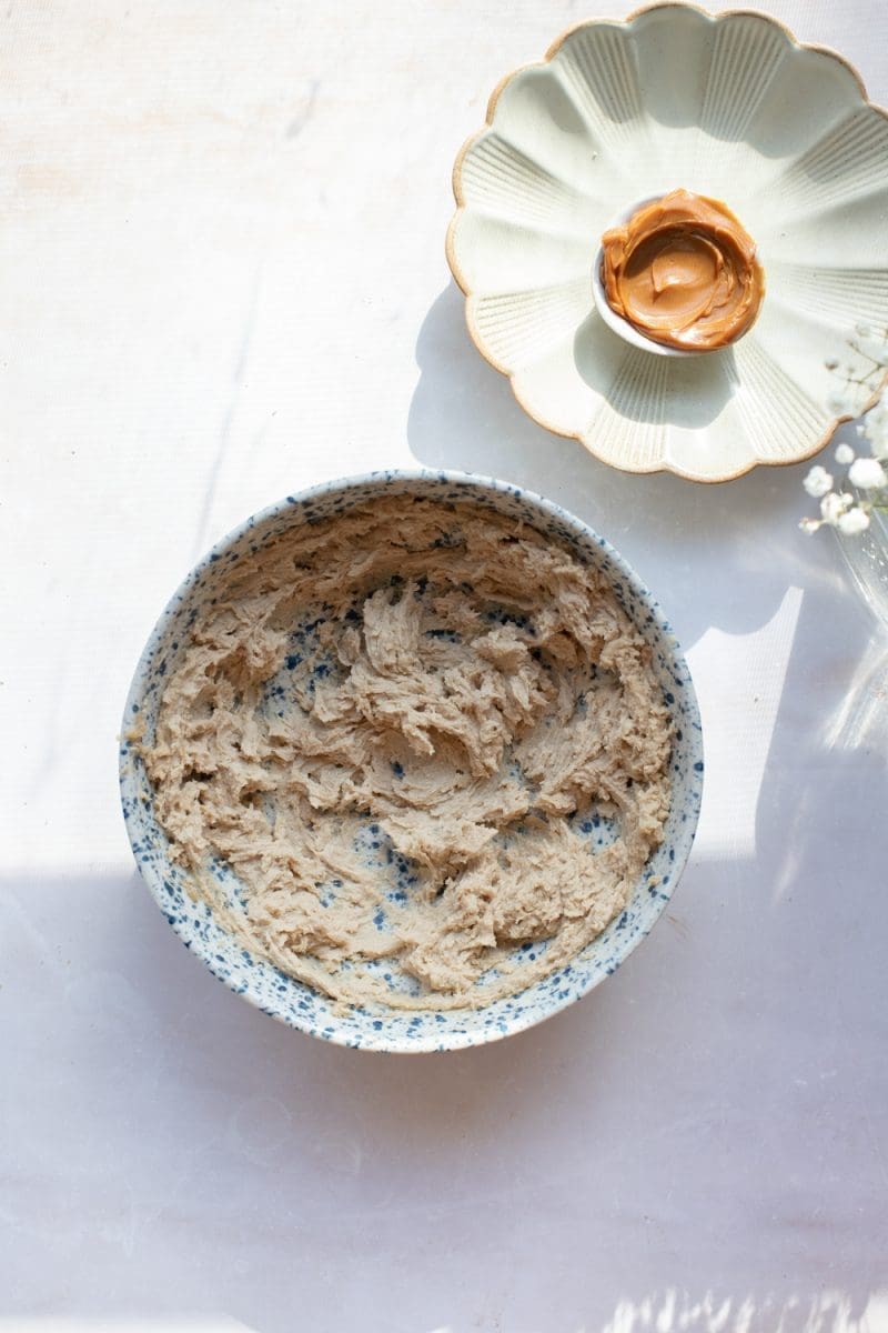 The butter and sugar beaten together in a mixing bowl.