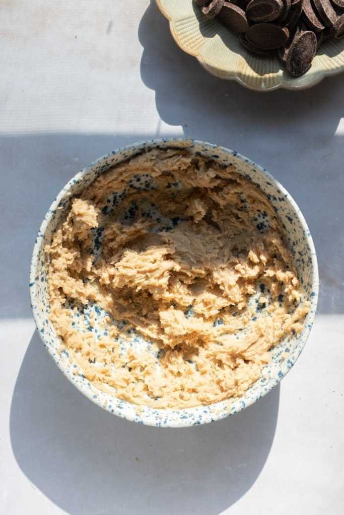 The butter and sugar beaten together in a mixing bowl.