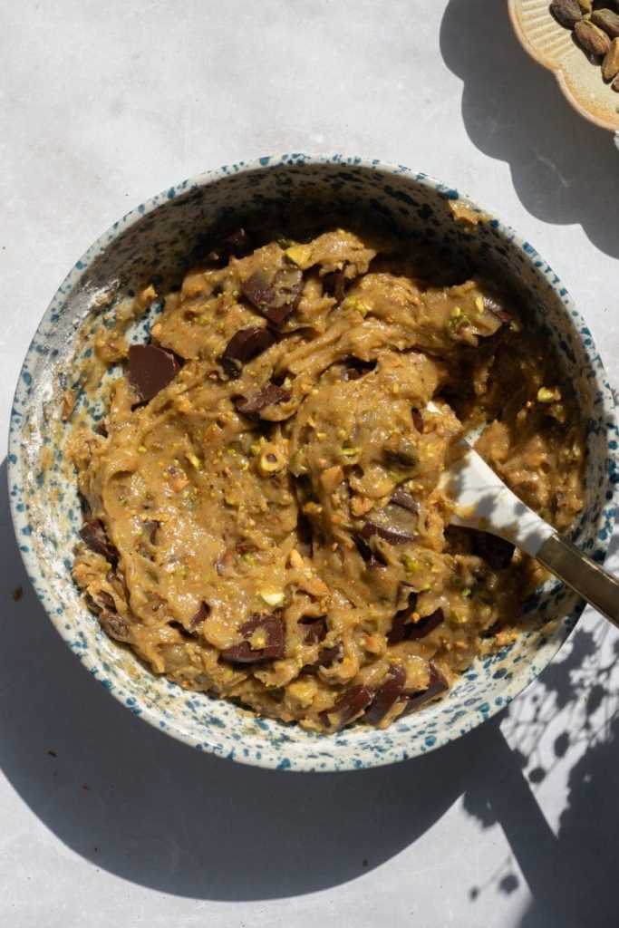 The finished pistachio chocolate chip cookie dough in the mixing bowl.