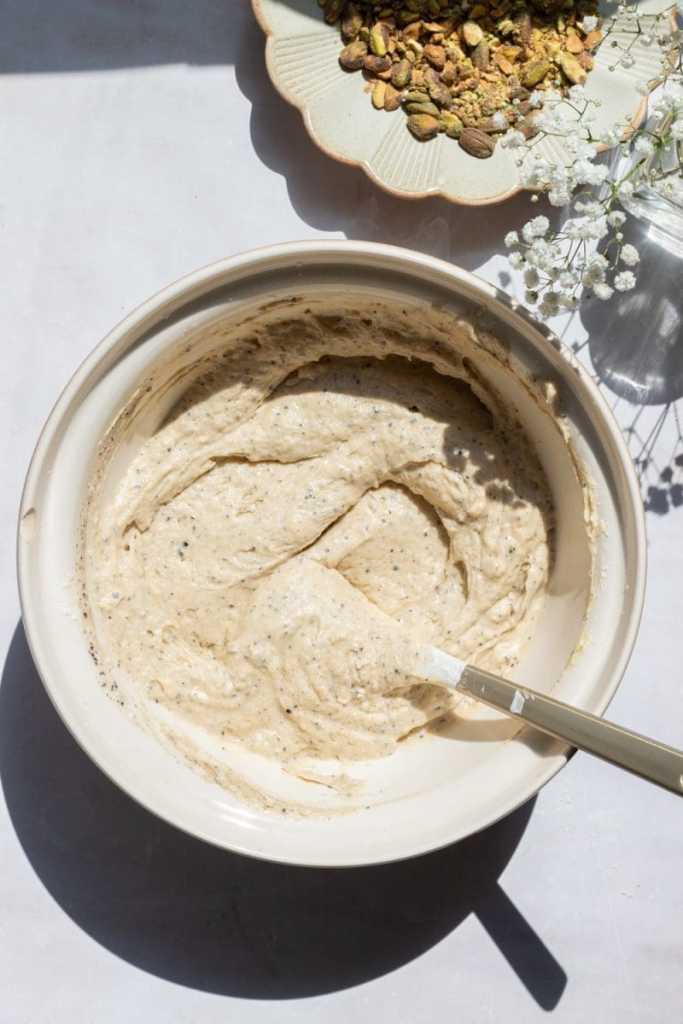 The finished pistachio coffee cake batter in a mixing bowl.