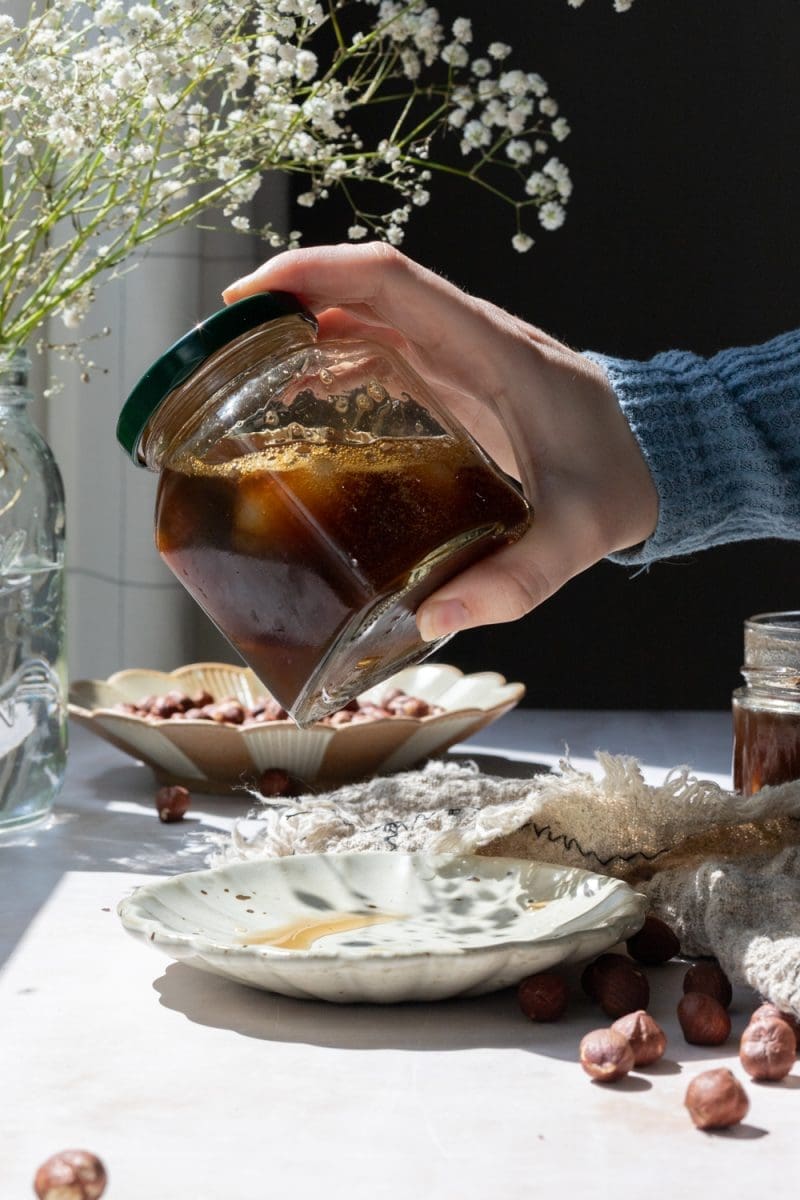 Shaking the container.