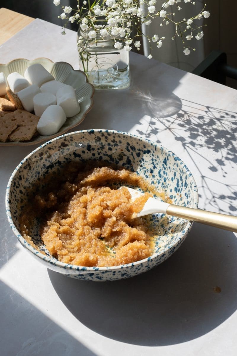 The mixing bowl with the brown butter and sugars mixed together.