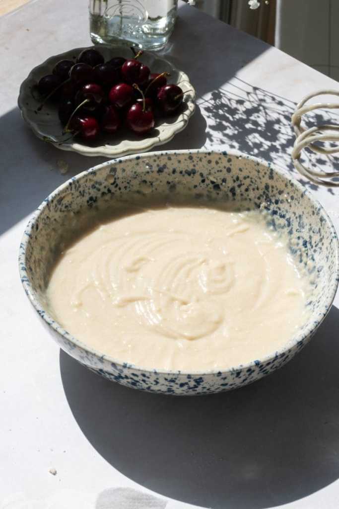 The finished cupcake batter in a mixing bowl.
