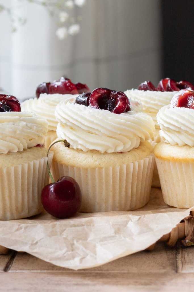 close up of the white chocolate cherry cupcakes