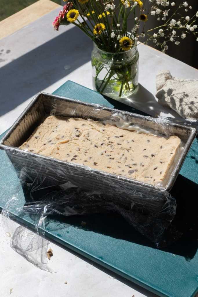 The assembled cookie dough ice cream sandwiches in the loaf pan.
