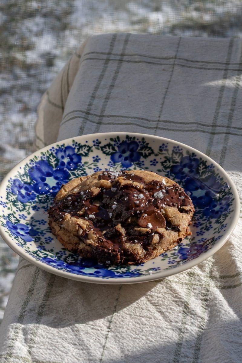 The single serve chocolate chip cookie on a plate.