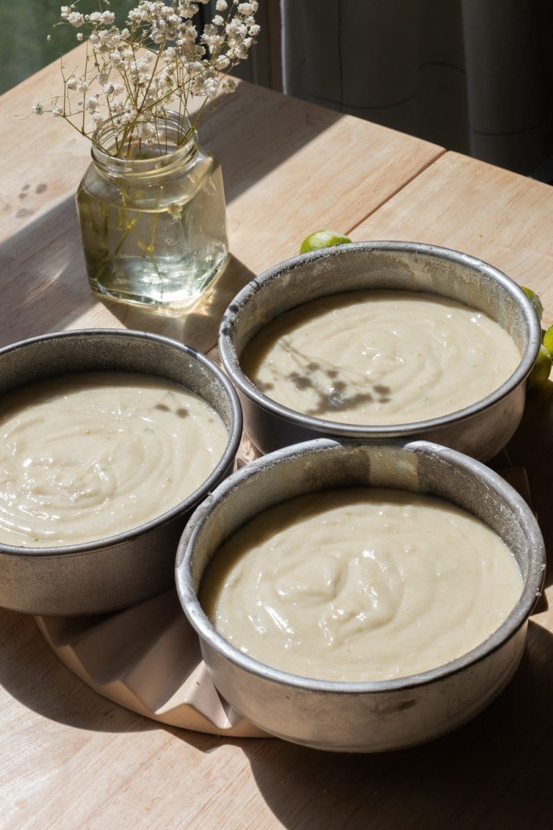 The cake batter divided up between the three 6-inch cake pans.