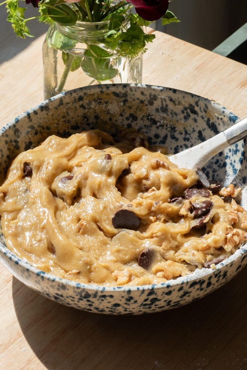 The finished rose chocolate chip cookie dough in a mixing bowl.