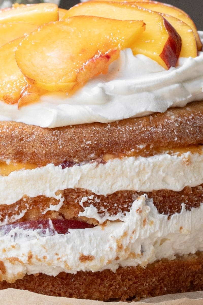 Close up of the layers of the peaches and cream cake.