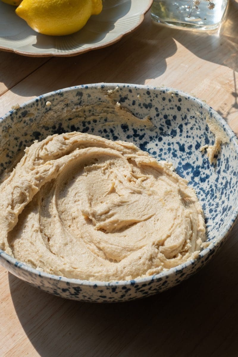 The cookie dough in a mixing bowl.