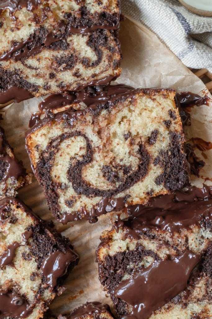 Close up of a slice of the marbled chocolate chip loaf cake.