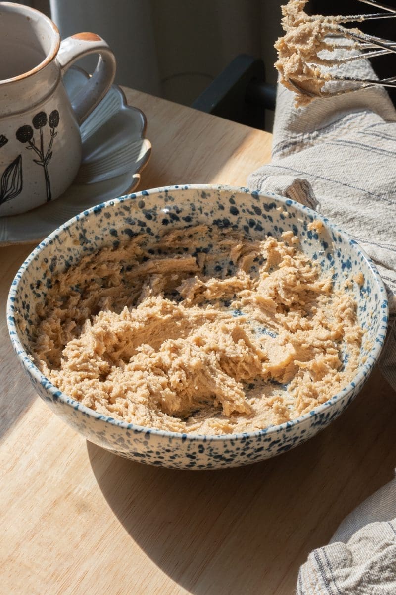 The butter and sugar beaten together in a mixing bowl.