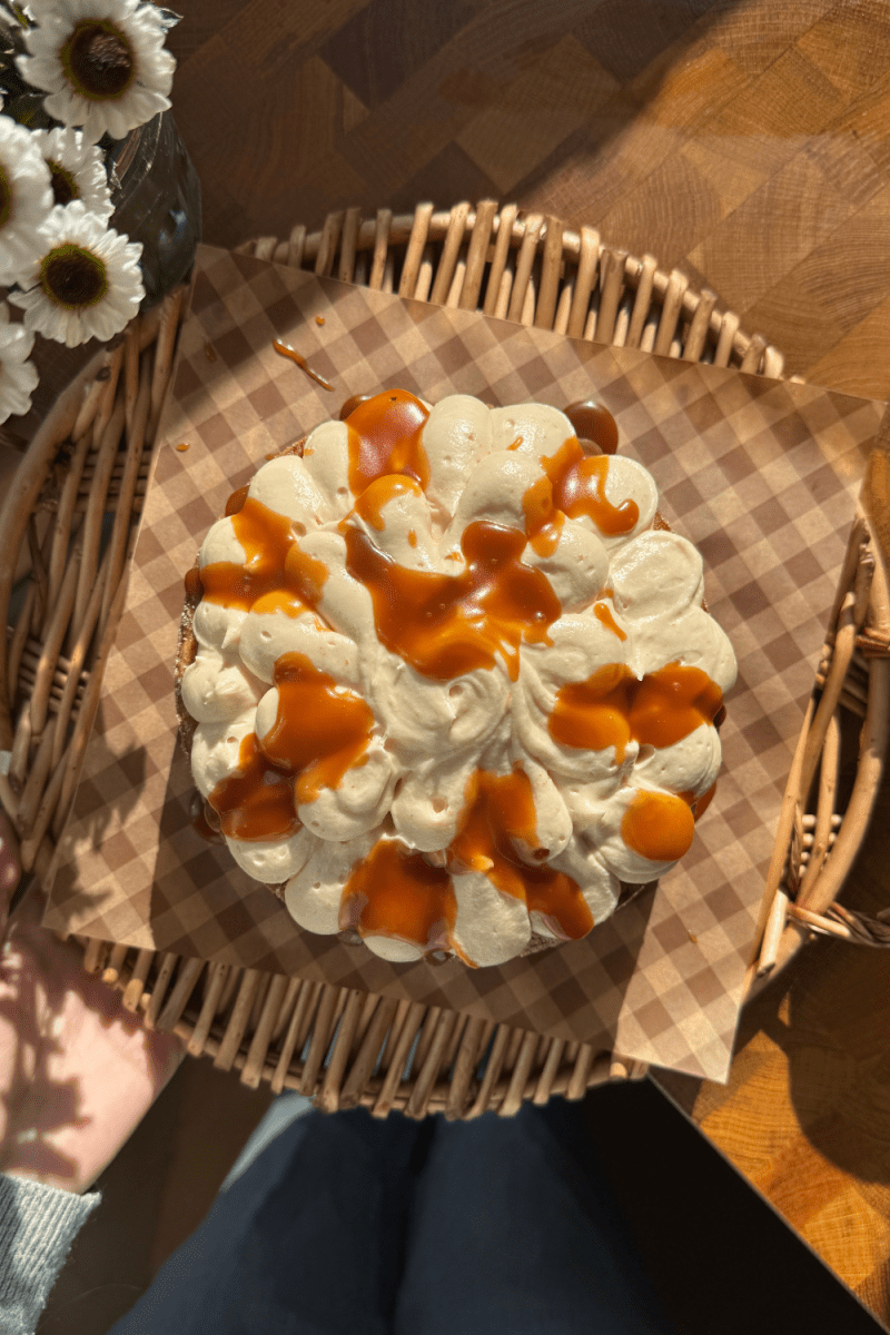 Overhead view of the frosted salted caramel banana cake.