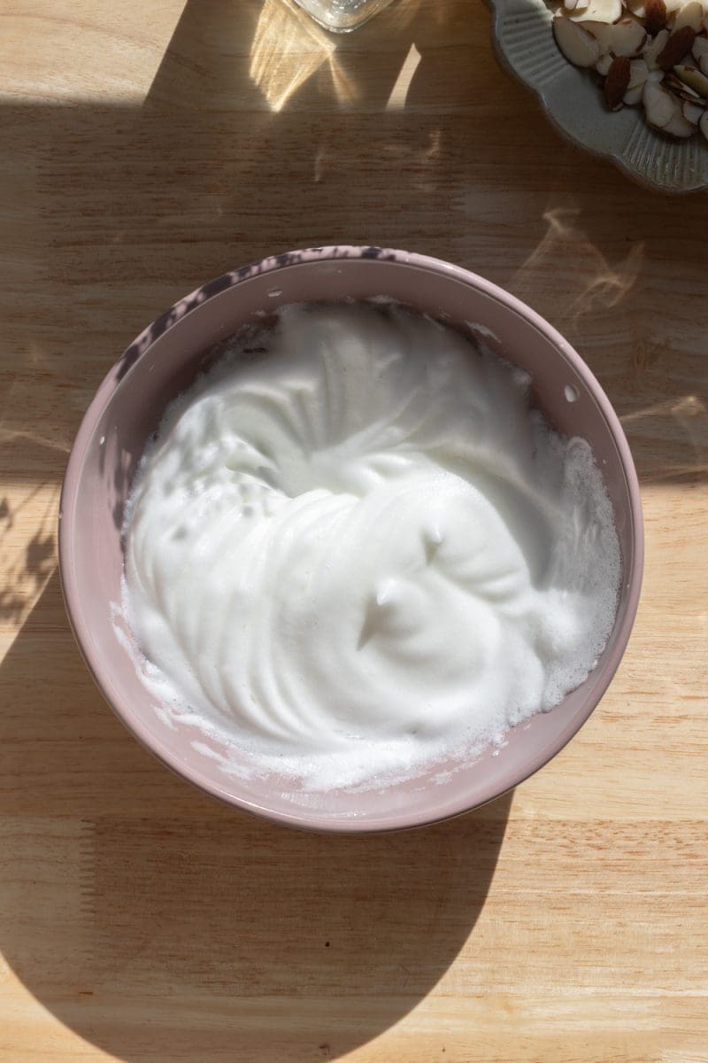 The egg whites beaten to stiff peaks.