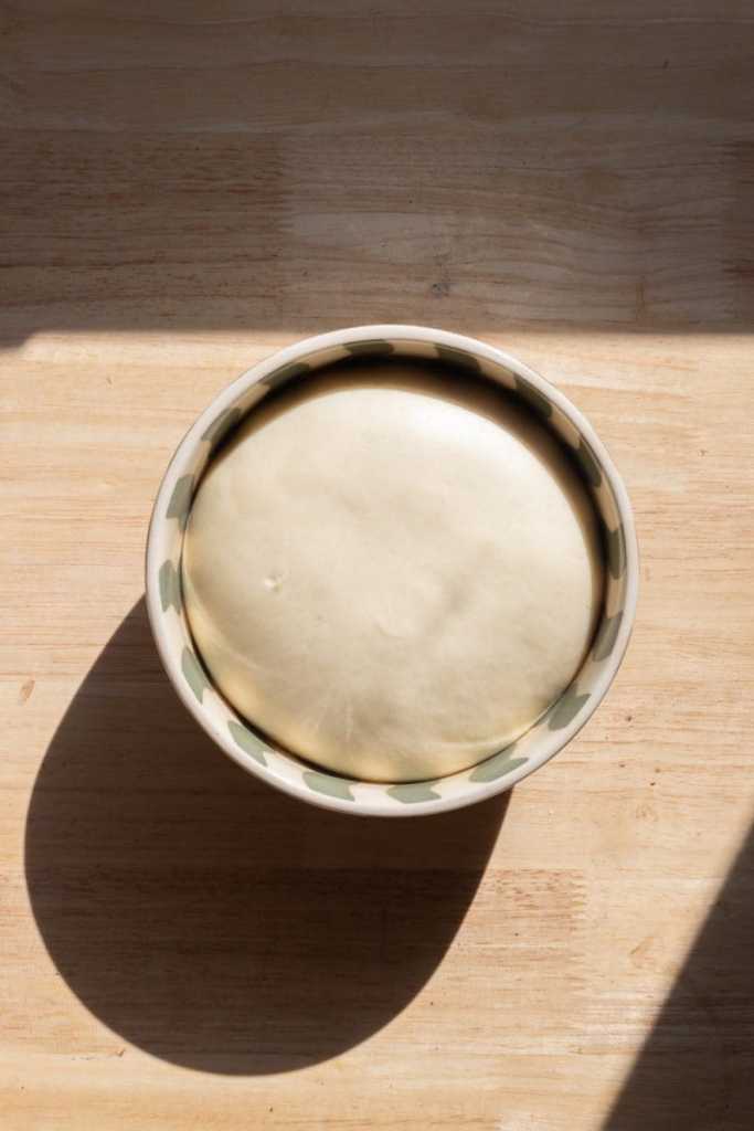 The brioche dough in a bowl.