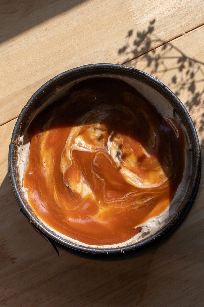Layering the cake, mascarpone, and caramel.