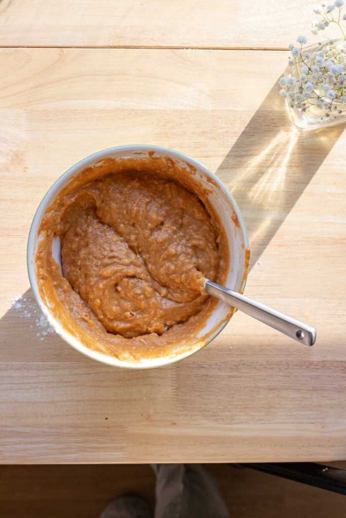 The dry ingredients mixed in to the wet ingredients.