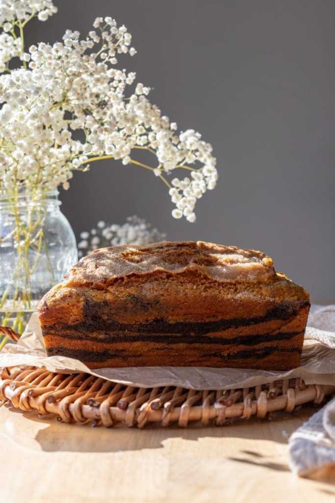 Side view of the baked chocolate marbled pumpkin bread.