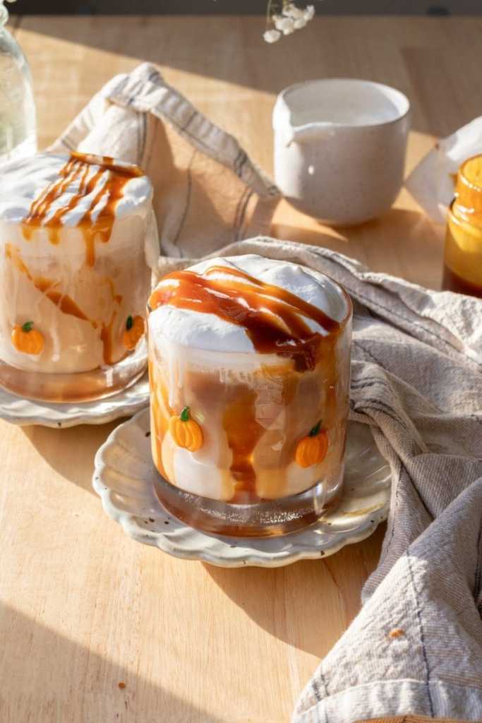 Angled view looking down at the iced caramel chai lattes.