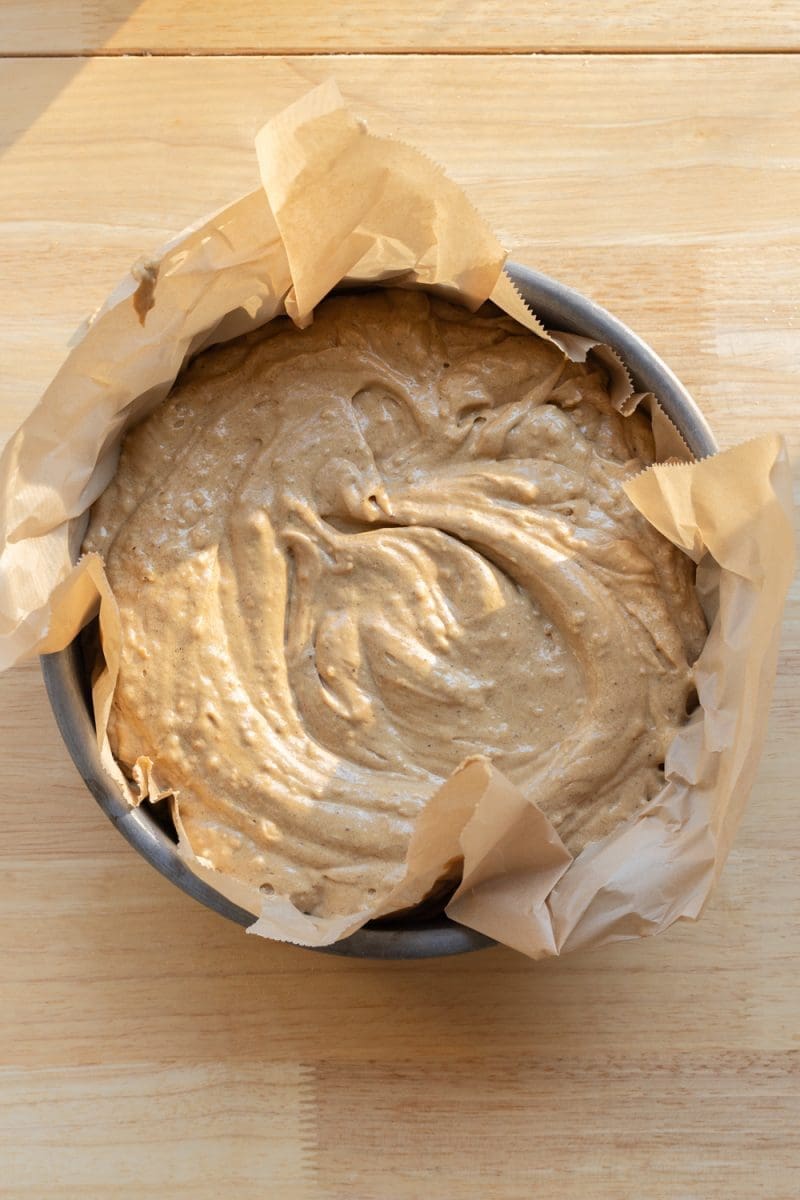 Cake pan with the gingerbread latte cake batter poured into it.