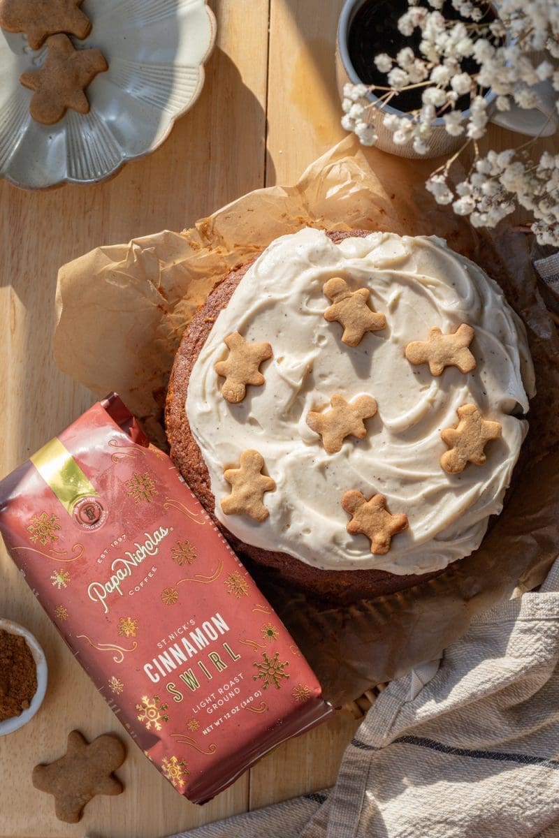 Gingerbread latte cake next to a bag of coffee.