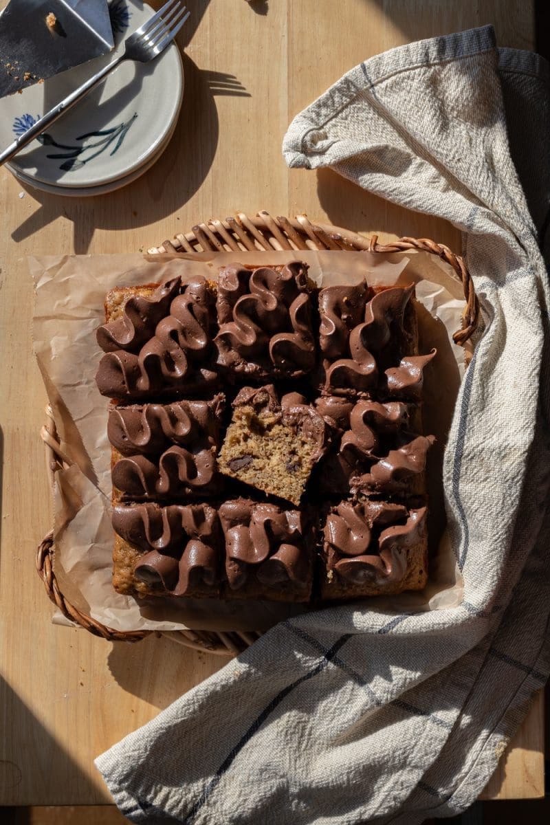 Flat lay of the mocha banana cake with one slice facing up towards the camera.