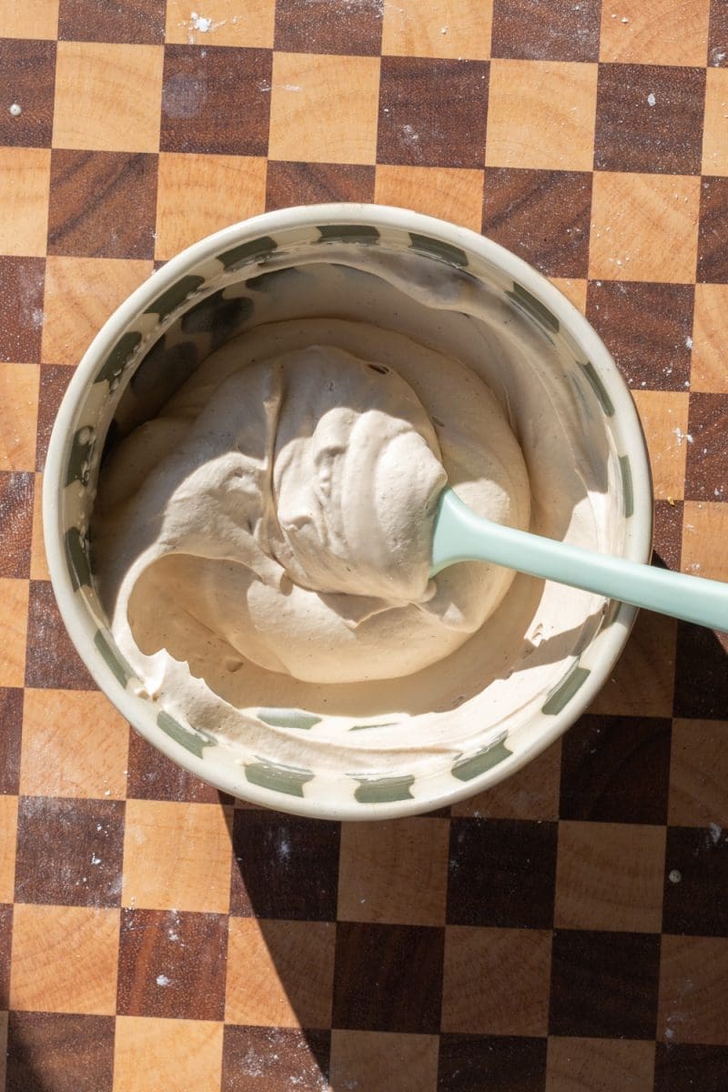 Espresso vanilla whipped cream in a mixing bowl.