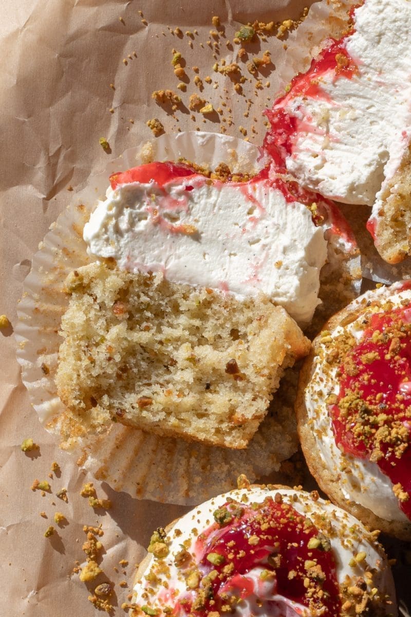 Close up cross-section of the small batch pistachio cupcakes.