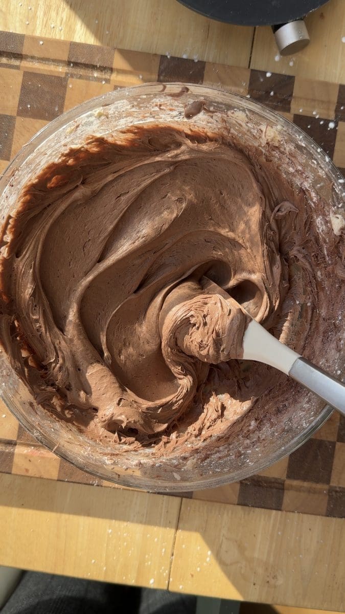 The mocha frosting in a bowl.