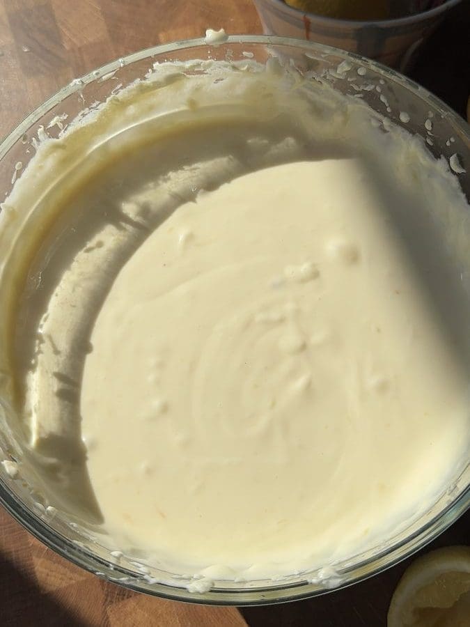 Finished cheesecake batter in mixing bowl.