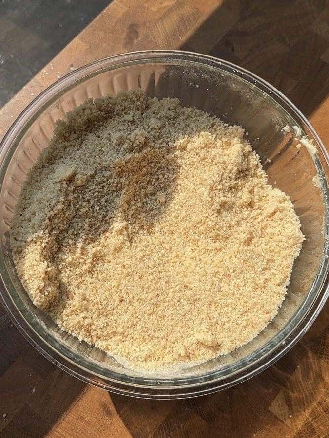 The dry ingredients and butter beaten together.