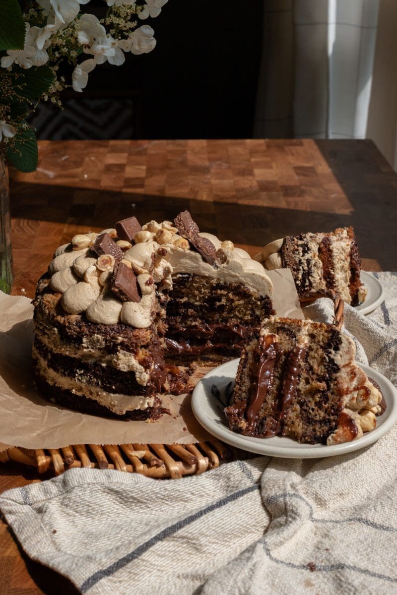 The sliced marbled chocolate hazelnut espresso cake on a tray.